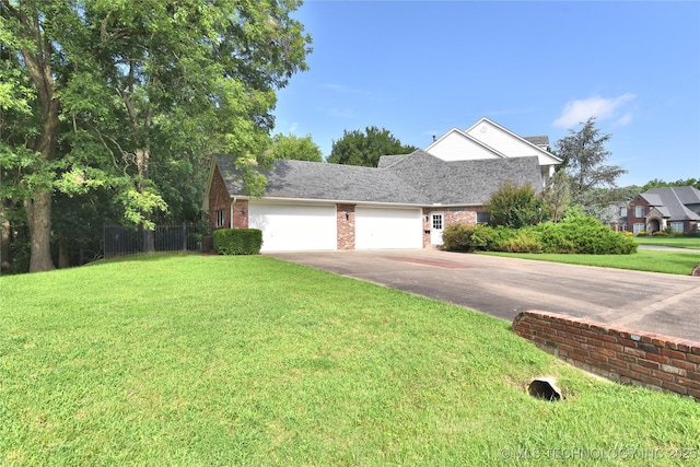 13706 S 18th St, Bixby, OK 74008 - view of front of house with driveway, a garage, and brick siding