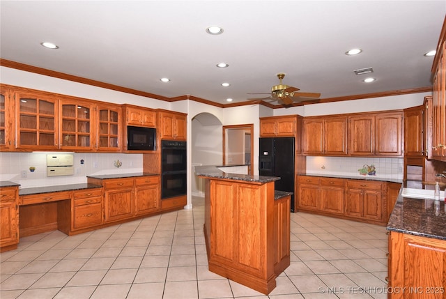 13706 S 18th St, Bixby, OK 74008 - kitchen featuring black appliances, recessed lighting, tasteful backsplash, brown cabinetry, and crown molding