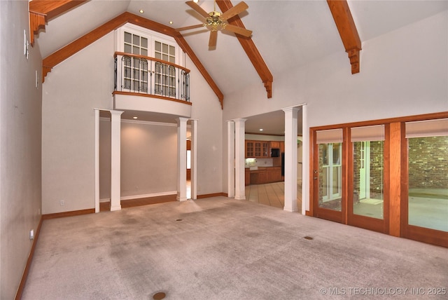 13706 S 18th St, Bixby, OK 74008 - unfurnished living room with decorative columns, ceiling fan, high vaulted ceiling, carpet flooring, and beamed ceiling