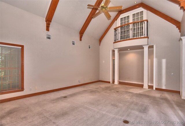 13706 S 18th St, Bixby, OK 74008 - unfurnished living room with high vaulted ceiling, a ceiling fan, ornate columns, carpet flooring, and beam ceiling