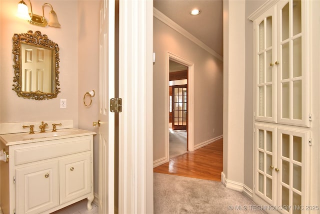 13706 S 18th St, Bixby, OK 74008 - bathroom with crown molding, vanity, and recessed lighting