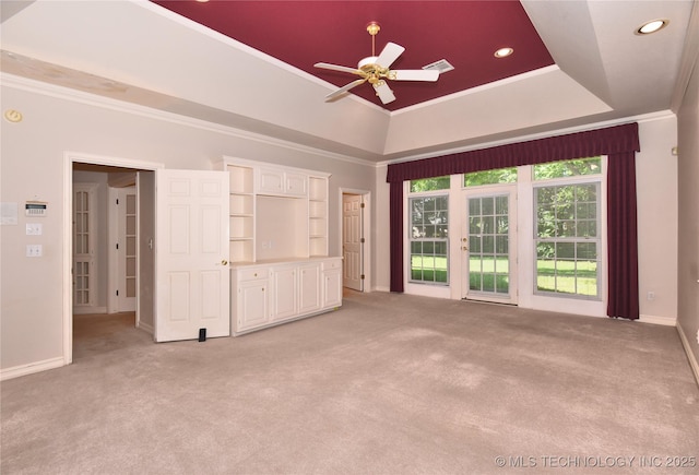 13706 S 18th St, Bixby, OK 74008 - unfurnished living room featuring a tray ceiling, light carpet, ceiling fan, ornamental molding, and recessed lighting