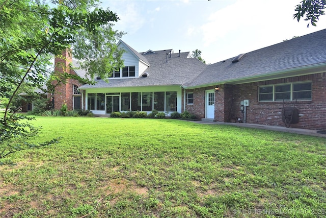 13706 S 18th St, Bixby, OK 74008 - back of property featuring a lawn, a shingled roof, and a chimney
