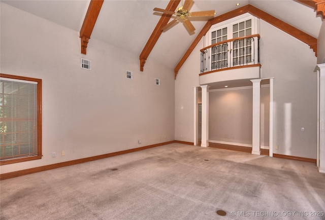 13706 S 18th St, Bixby, OK 74008 - unfurnished living room with high vaulted ceiling, a ceiling fan, ornate columns, carpet flooring, and beam ceiling