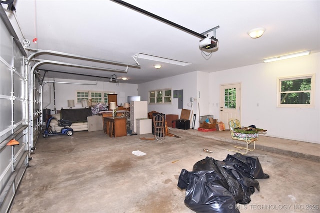 13706 S 18th St, Bixby, OK 74008 - garage featuring electric panel and a garage door opener