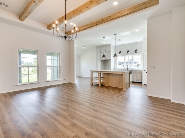 7202 E 132nd St S, Bixby, OK 74008 - unfurnished living room with beam ceiling, recessed lighting, a chandelier, and dark wood-style floors