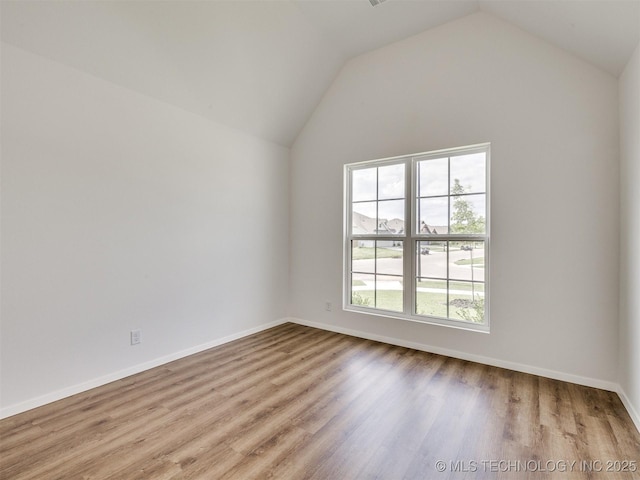 7202 E 132nd St S, Bixby, OK 74008 - unfurnished room with lofted ceiling and wood finished floors