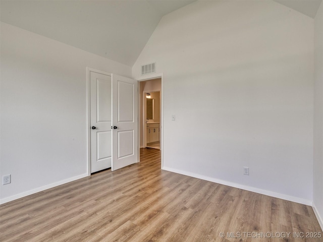 7202 E 132nd St S, Bixby, OK 74008 - empty room featuring light wood finished floors and high vaulted ceiling