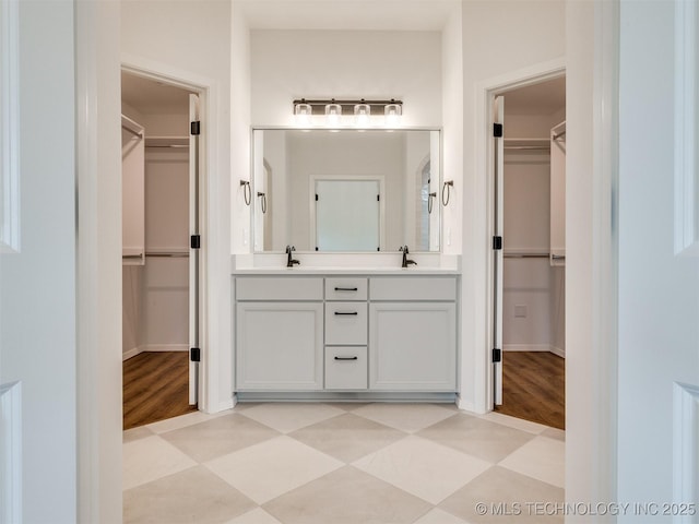 7202 E 132nd St S, Bixby, OK 74008 - full bath featuring double vanity, a spacious closet, and tile patterned floors