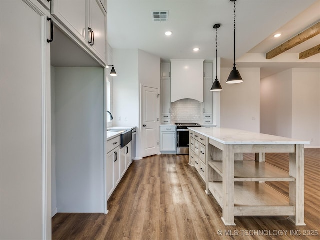 7202 E 132nd St S, Bixby, OK 74008 - kitchen with stainless steel range, dark wood-style floors, tasteful backsplash, a center island, and open shelves