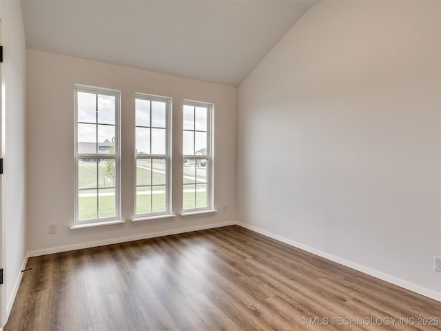 7202 E 132nd St S, Bixby, OK 74008 - unfurnished room featuring vaulted ceiling and wood finished floors