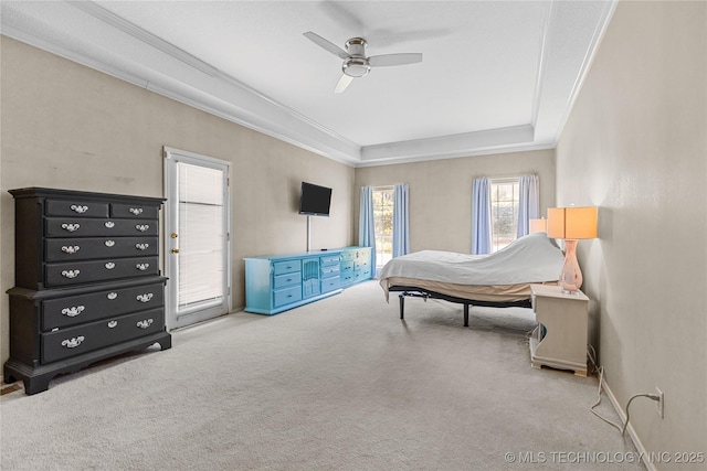 9810 E 96th Pl, Tulsa, OK 74133 - bedroom with carpet flooring, a tray ceiling, crown molding, and a ceiling fan