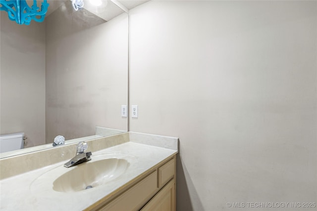 9810 E 96th Pl, Tulsa, OK 74133 - bathroom featuring vanity and toilet