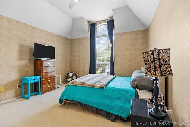 9810 E 96th Pl, Tulsa, OK 74133 - carpeted bedroom with lofted ceiling and ceiling fan