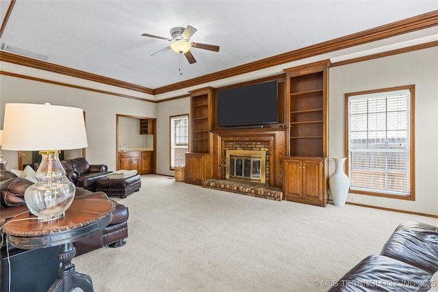 9810 E 96th Pl, Tulsa, OK 74133 - living room with carpet flooring, a ceiling fan, crown molding, a brick fireplace, and healthy amount of natural light