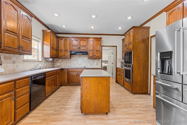 9810 E 96th Pl, Tulsa, OK 74133 - kitchen with black appliances, ornamental molding, brown cabinetry, washer / clothes dryer, and backsplash