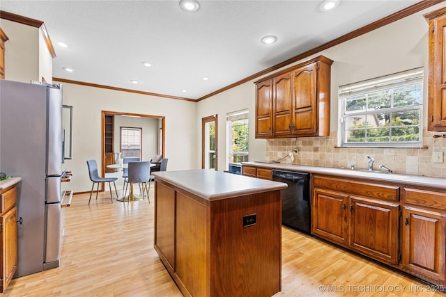 9810 E 96th Pl, Tulsa, OK 74133 - kitchen with dishwasher, freestanding refrigerator, ornamental molding, light wood-style flooring, and a center island