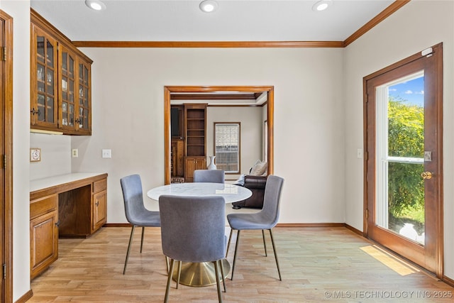 9810 E 96th Pl, Tulsa, OK 74133 - dining room with ornamental molding, light wood-type flooring, recessed lighting, and built in study area