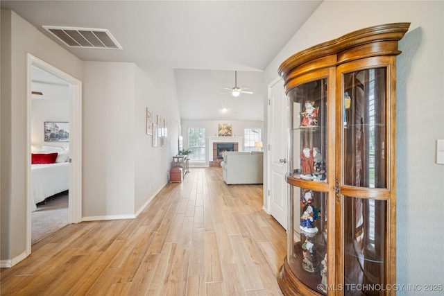 1600 S Ironwood Ave, Broken Arrow, OK 74012 - corridor featuring lofted ceiling and light wood-style floors