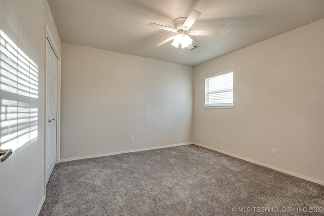 2520 Arlington Blvd, Ada, OK 74820 - carpeted spare room with ceiling fan and baseboards