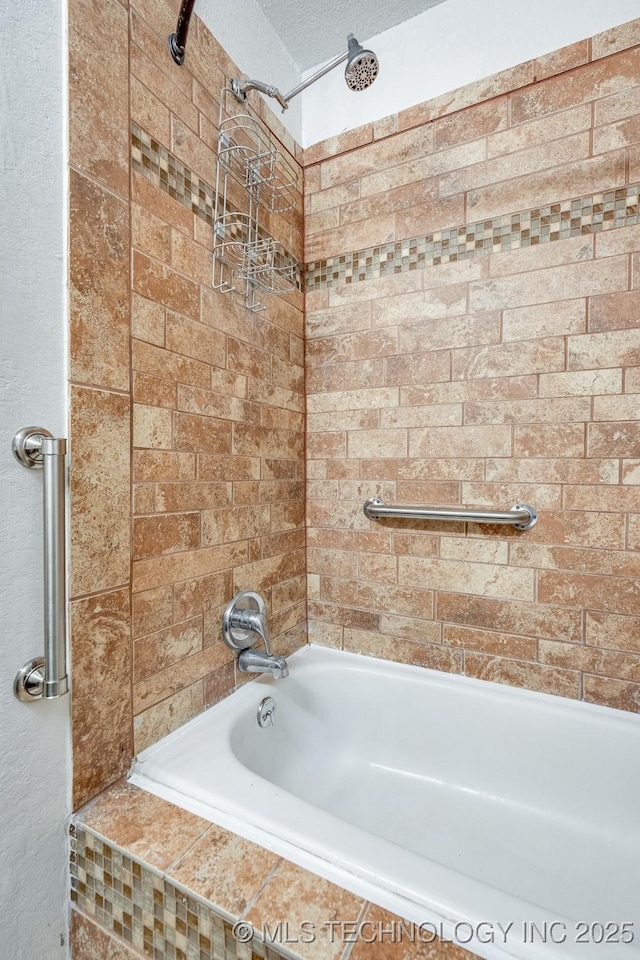 2520 Arlington Blvd, Ada, OK 74820 - bathroom with tiled shower / bath combo