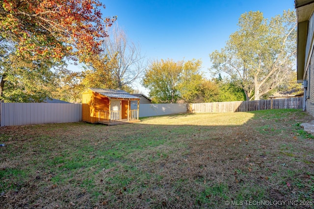 2520 Arlington Blvd, Ada, OK 74820 - fenced backyard with a storage unit
