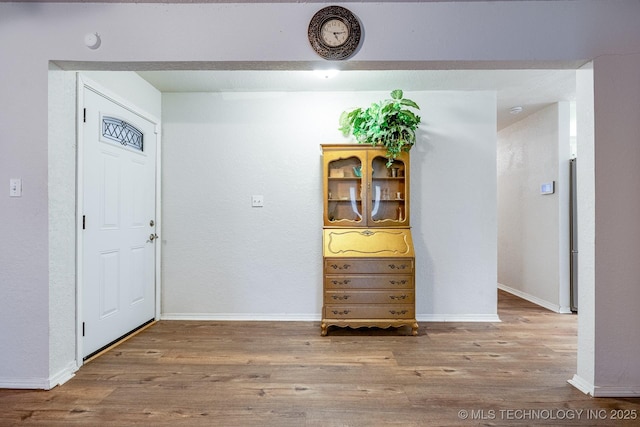 2520 Arlington Blvd, Ada, OK 74820 - entrance foyer with wood finished floors and baseboards