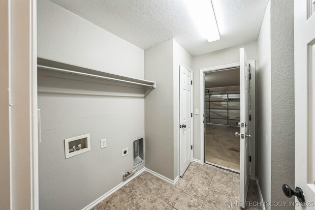 12003 S Tamarack St W, Jenks, OK 74037 - washroom featuring electric dryer hookup, hookup for a washing machine, gas dryer hookup, a textured ceiling, and light tile patterned floors