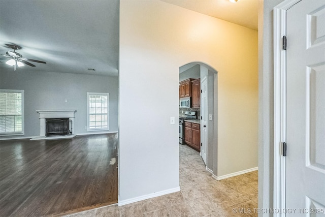 12003 S Tamarack St W, Jenks, OK 74037 - corridor featuring arched walkways and baseboards