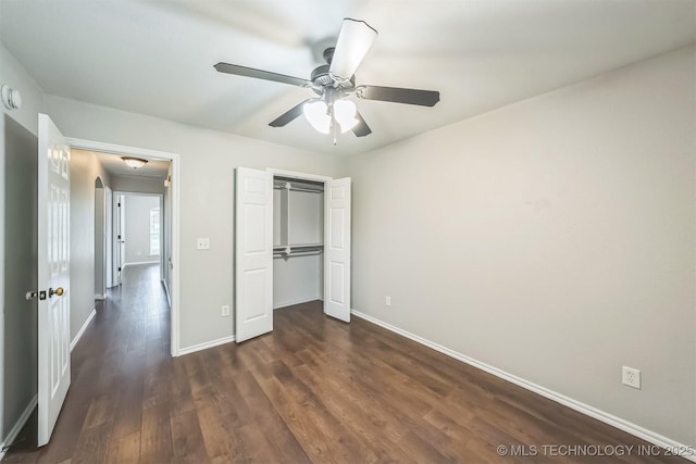 12003 S Tamarack St W, Jenks, OK 74037 - unfurnished bedroom featuring dark wood-style floors, a closet, attic access, and ceiling fan