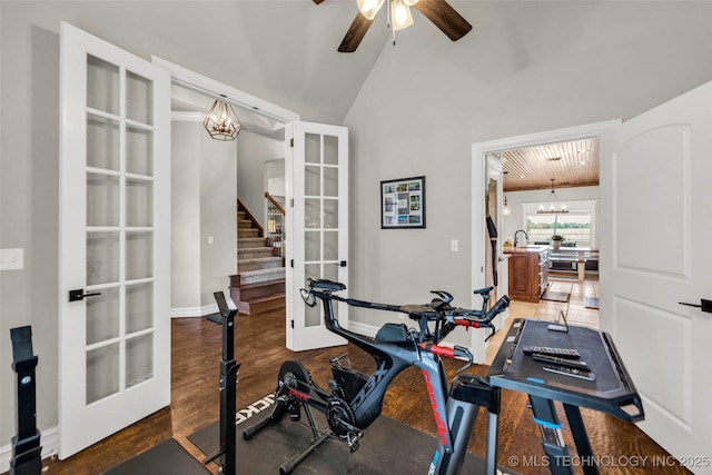 6108 E 95th St, Sperry, OK 74073 - workout area featuring a chandelier, a ceiling fan, wood finished floors, french doors, and vaulted ceiling