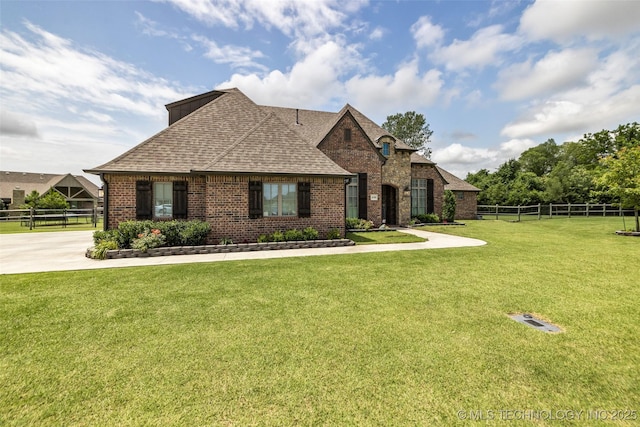 6108 E 95th St, Sperry, OK 74073 - french country style house with brick siding and roof with shingles