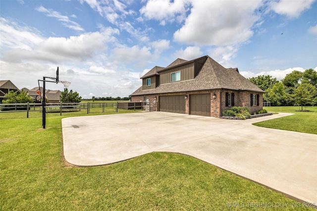 6108 E 95th St, Sperry, OK 74073 - view of home's exterior featuring board and batten siding, brick siding, concrete driveway, an attached garage, and roof with shingles