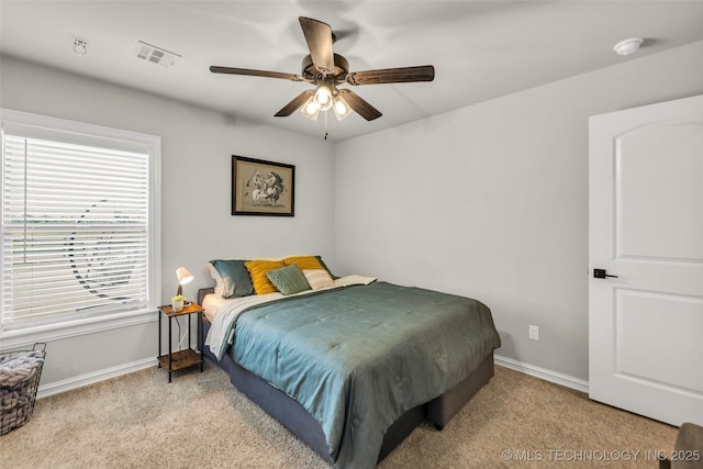 6108 E 95th St, Sperry, OK 74073 - bedroom with light colored carpet and a ceiling fan
