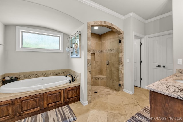 6108 E 95th St, Sperry, OK 74073 - bathroom featuring a garden tub, a stall shower, vanity, crown molding, and tile patterned flooring