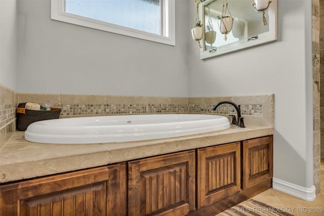 6108 E 95th St, Sperry, OK 74073 - full bathroom featuring a garden tub and tile patterned floors