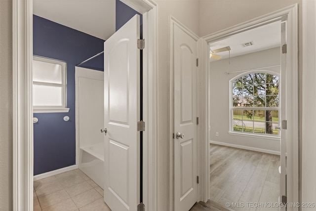 108 W 135th St, Skiatook, OK 74070 - hall with baseboards and light wood-style flooring