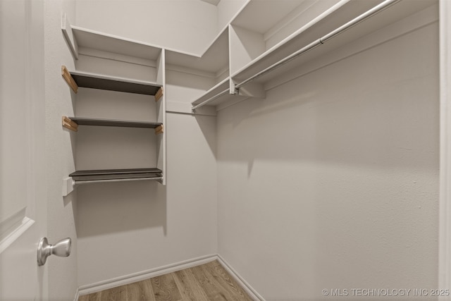 108 W 135th St, Skiatook, OK 74070 - spacious closet with wood finished floors