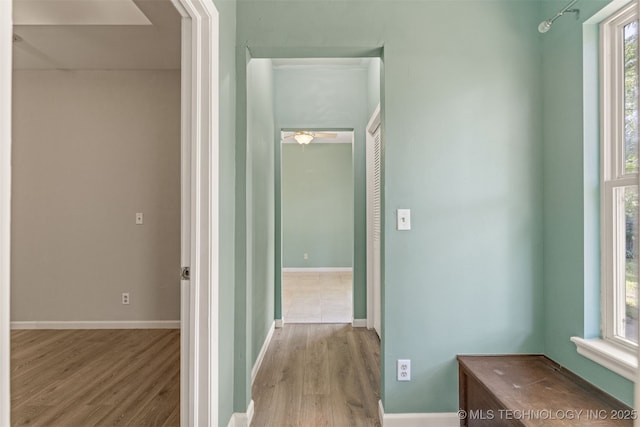 108 W 135th St, Skiatook, OK 74070 - corridor with wood finished floors and baseboards