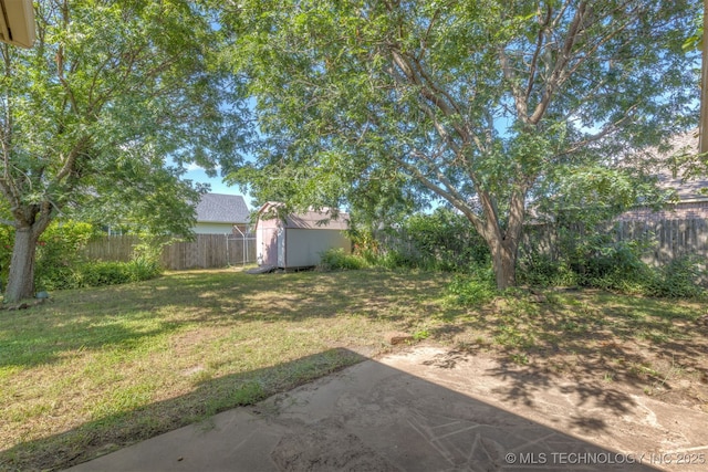108 W 135th St, Skiatook, OK 74070 - fenced backyard featuring a shed and a patio