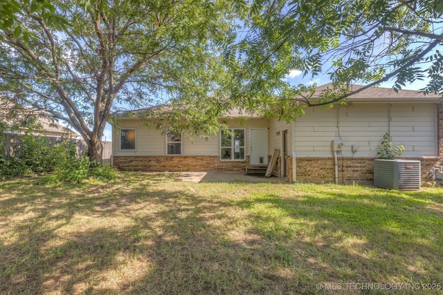 108 W 135th St, Skiatook, OK 74070 - rear view of property with brick siding, a patio, and entry steps