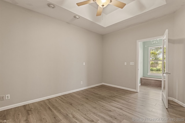 108 W 135th St, Skiatook, OK 74070 - spare room featuring light wood finished floors and a ceiling fan