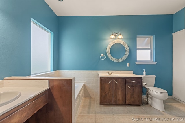 108 W 135th St, Skiatook, OK 74070 - full bathroom with vanity, tile patterned floors, and a bath
