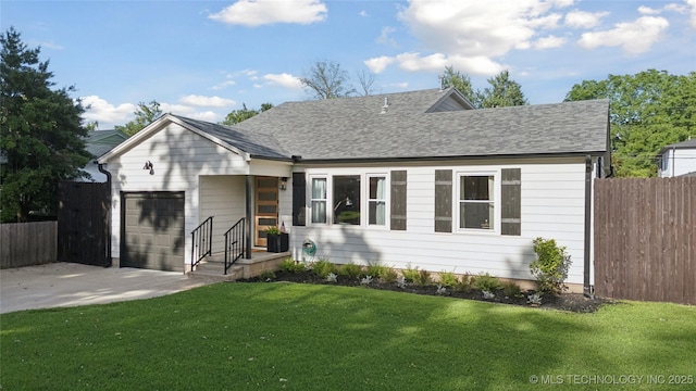 3919 S Detroit Ave, Tulsa, OK 74105 - view of front of house featuring a garage, driveway, and a shingled roof