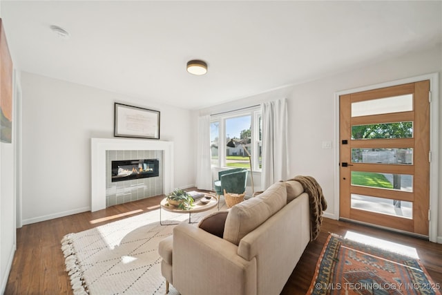 3919 S Detroit Ave, Tulsa, OK 74105 - living room featuring dark wood finished floors and a tile fireplace