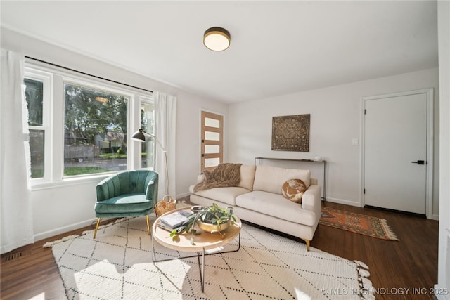 3919 S Detroit Ave, Tulsa, OK 74105 - living area featuring baseboards and wood finished floors