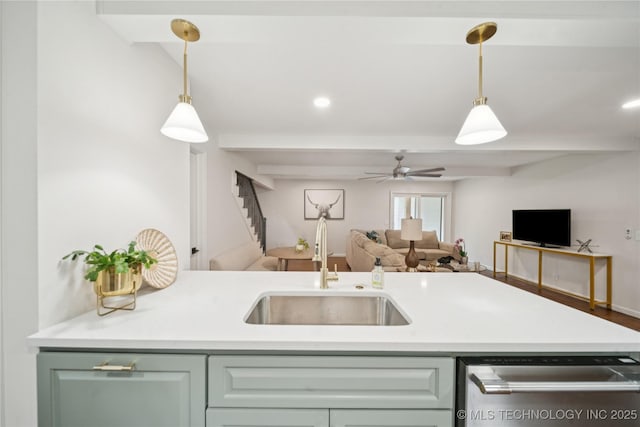 3919 S Detroit Ave, Tulsa, OK 74105 - kitchen with stainless steel dishwasher, open floor plan, pendant lighting, a ceiling fan, and beam ceiling