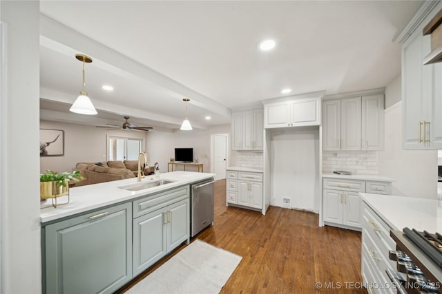 3919 S Detroit Ave, Tulsa, OK 74105 - kitchen with appliances with stainless steel finishes, a ceiling fan, recessed lighting, white cabinets, and tasteful backsplash