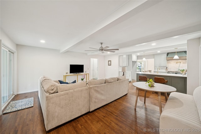 3919 S Detroit Ave, Tulsa, OK 74105 - living area with dark wood-type flooring, recessed lighting, a ceiling fan, and beamed ceiling