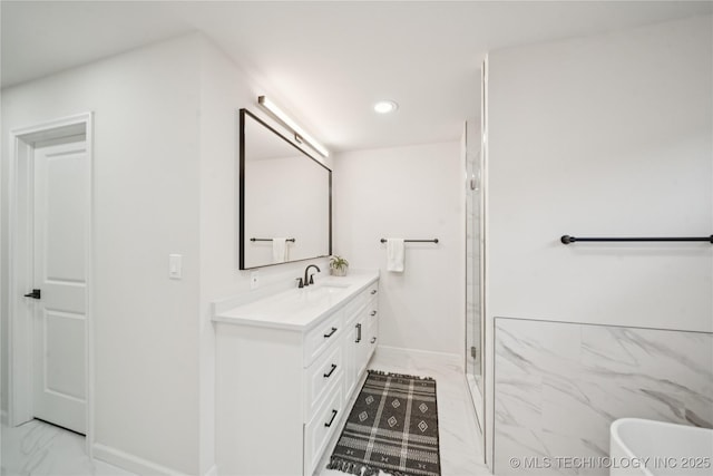 3919 S Detroit Ave, Tulsa, OK 74105 - bathroom featuring marble look tiles, double vanity, a freestanding bath, recessed lighting, and a shower stall